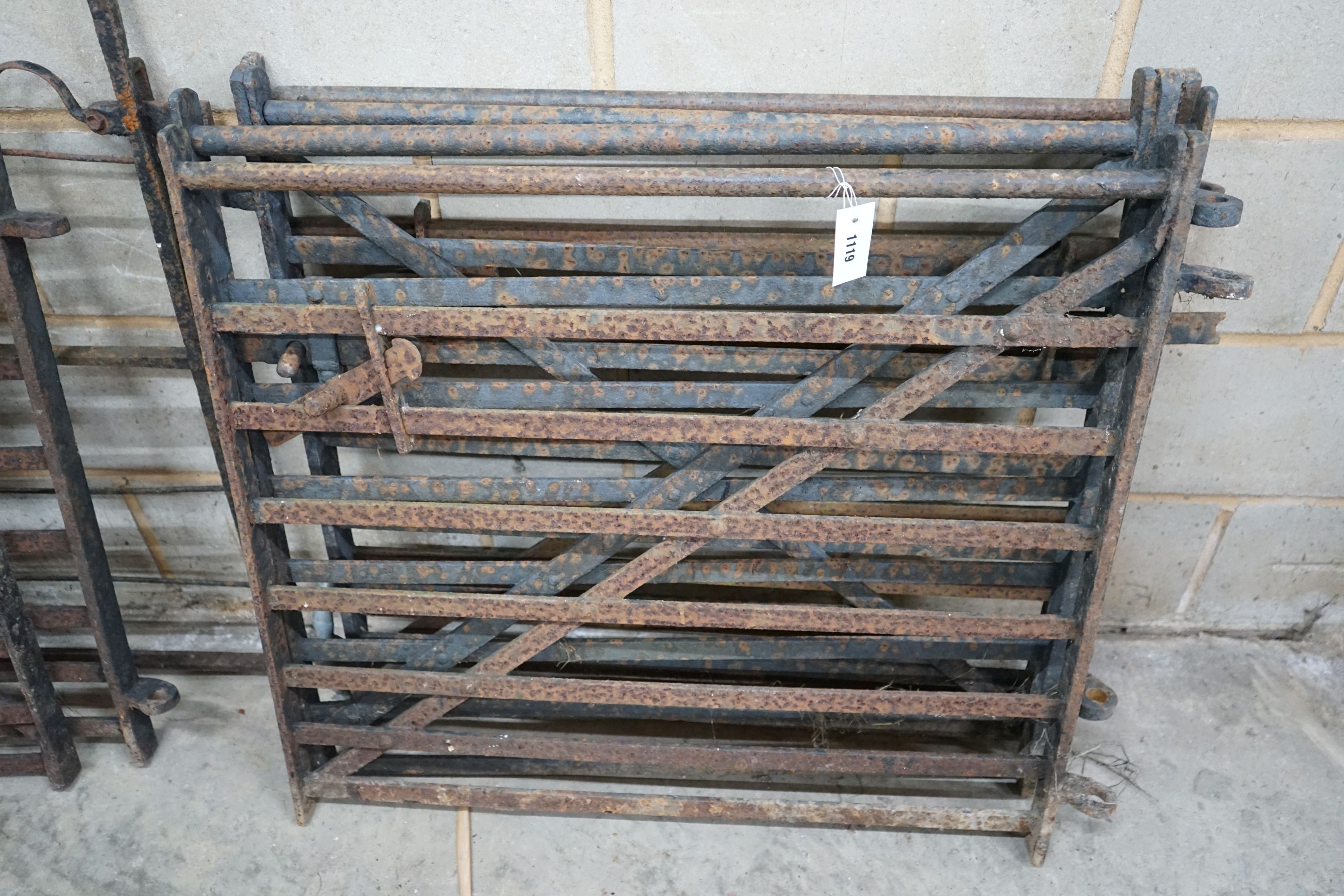 A set of four wrought iron garden gates, width 85cm, height 78cm